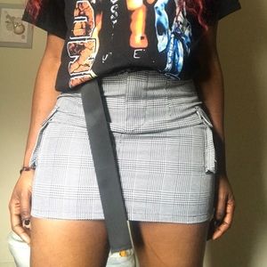 Plaid skirt includes belt.